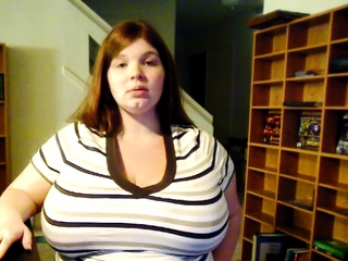 Busty curly brunette with big boobs fucks on couch