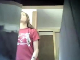 Candid camera: girl shaving in bathroom