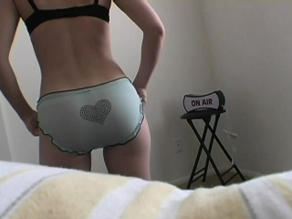 A spy camera catches sexy Anna in the middle of changing her clothes